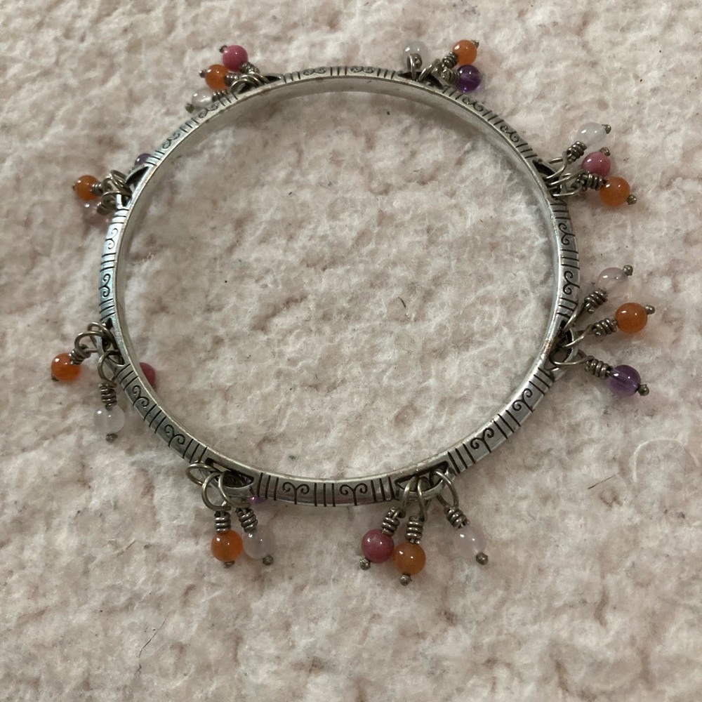 Brighton engraved silver bangle with dangling beads